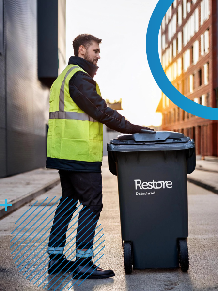 man at a paper pile